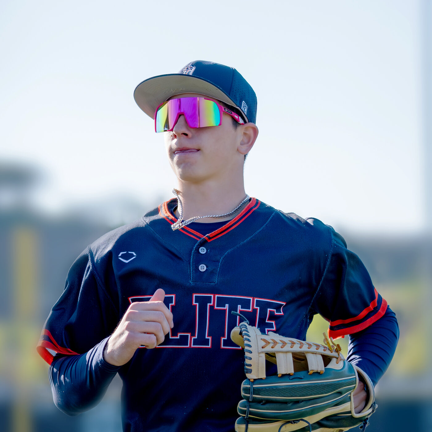 Drakon athlete in the field wearing Drakon performance sunglasses